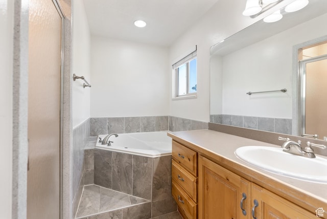 2047 E 1850 S, Spanish Fork, UT 84660 - bathroom featuring vanity, a garden tub, and a stall shower