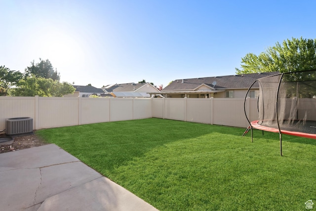 2047 E 1850 S, Spanish Fork, UT 84660 - view of yard with central AC unit, a patio area, and a trampoline