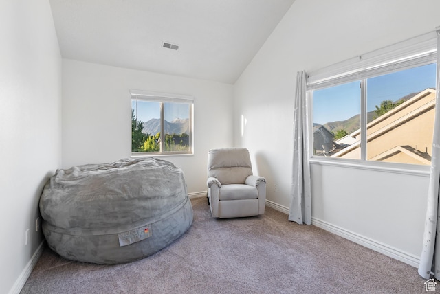 2047 E 1850 S, Spanish Fork, UT 84660 - living area with carpet, vaulted ceiling, and baseboards