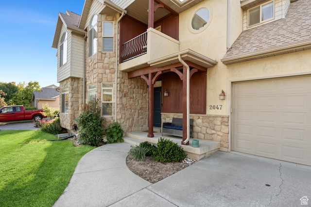 2047 E 1850 S, Spanish Fork, UT 84660 - entrance to property featuring stone siding, a balcony, a lawn, and a shingled roof