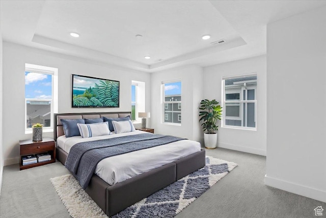 3466 S Peebles Ct E, South Salt Lake, UT 84115 - bedroom with a tray ceiling, light colored carpet, multiple windows, and recessed lighting