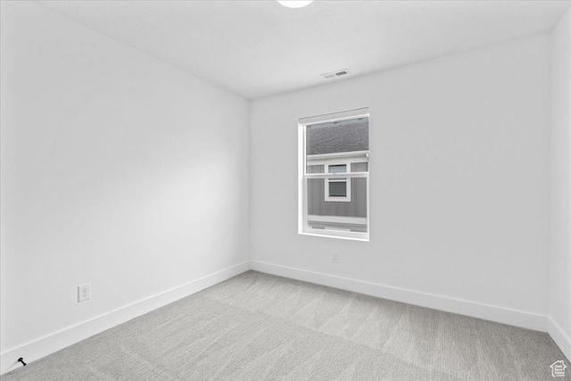 3466 S Peebles Ct E, South Salt Lake, UT 84115 - spare room with light colored carpet and baseboards