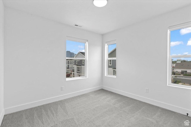 3466 S Peebles Ct E, South Salt Lake, UT 84115 - carpeted empty room featuring baseboards