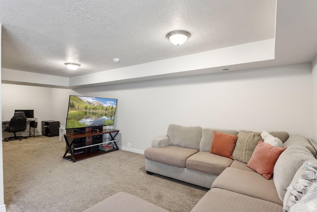 3880 S 1580 W Unit 224, West Valley City, UT 84119 - living room with an office area, carpet flooring, a textured ceiling, and baseboards