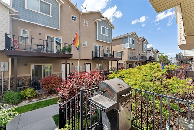 3880 S 1580 W Unit 224, West Valley City, UT 84119 - balcony featuring a residential view and a grill