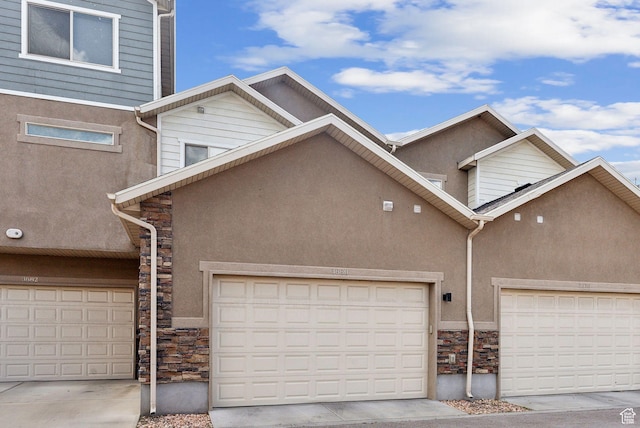 3880 S 1580 W Unit 224, West Valley City, UT 84119 - townhome / multi-family property with stone siding and stucco siding