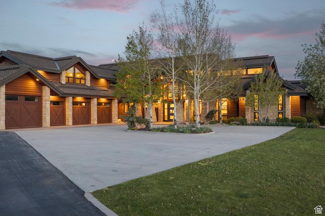 7778 N Greenfield Dr, Park City, UT 84098 - view of front facade with stone siding, driveway, and a front yard