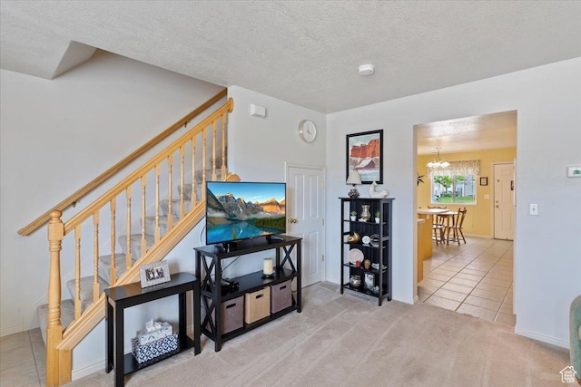 1338 E 6125 S, South Ogden, UT 84405 - tiled living area featuring stairs, a textured ceiling, a chandelier, carpet, and baseboards