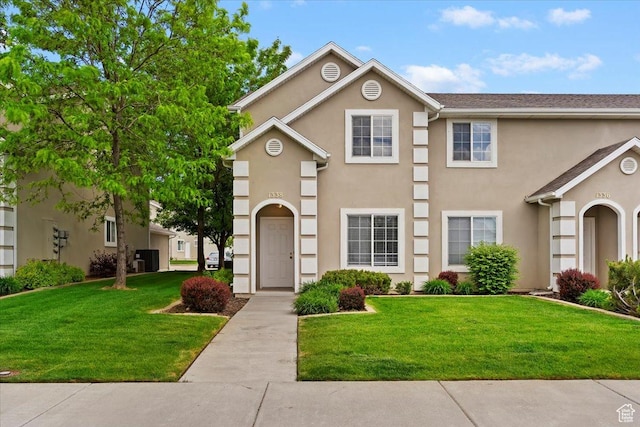 1338 E 6125 S, South Ogden, UT 84405 - multi unit property with stucco siding and a front yard