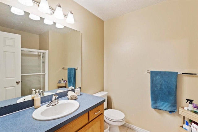 1338 E 6125 S, South Ogden, UT 84405 - full bath featuring toilet, vanity, a shower with door, and tile patterned flooring