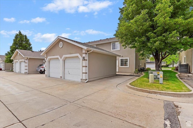 1338 E 6125 S, South Ogden, UT 84405 - view of front of home featuring stucco siding and cooling unit