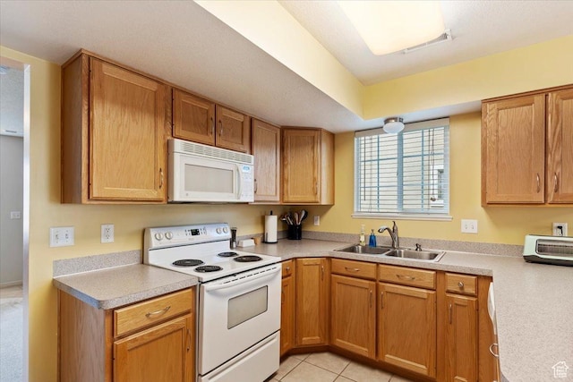 1338 E 6125 S, South Ogden, UT 84405 - kitchen featuring white appliances, a sink, and light countertops