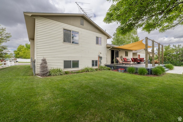 2155 W 900 N, Maeser, UT 84078 - rear view of house with a lawn and a patio