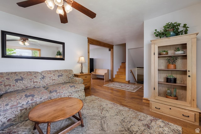 2155 W 900 N, Maeser, UT 84078 - living area featuring a ceiling fan, stairs, and wood finished floors