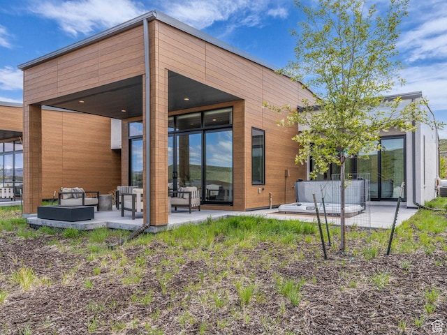 6417 Double Deer Loop, Park City, UT 84098 - back of property with an outdoor living space and a patio
