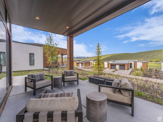 6417 Double Deer Loop, Park City, UT 84098 - view of patio with outdoor lounge area and a mountain view