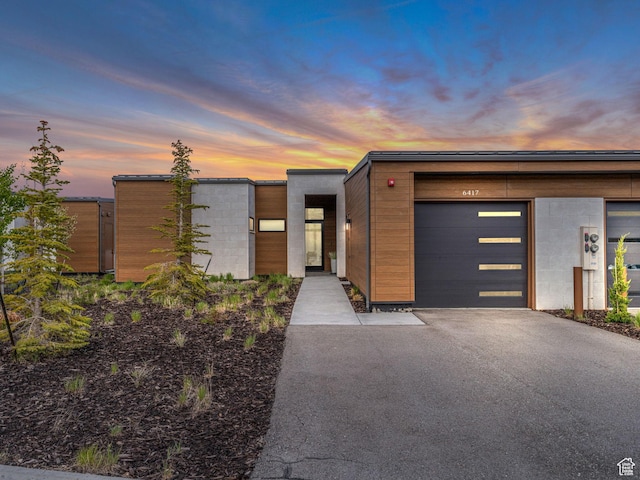 6417 Double Deer Loop, Park City, UT 84098 - contemporary house with driveway and a garage