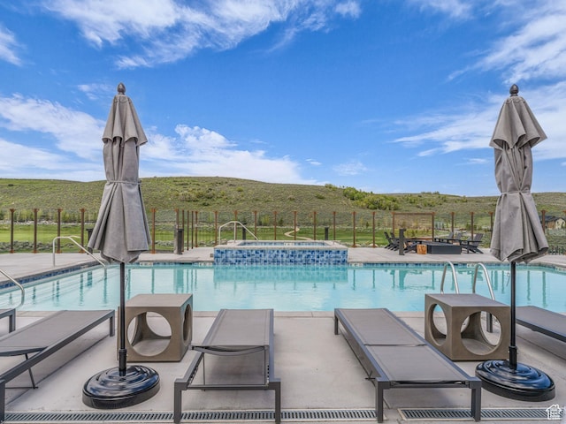 6417 Double Deer Loop, Park City, UT 84098 - view of swimming pool with a pool with connected hot tub