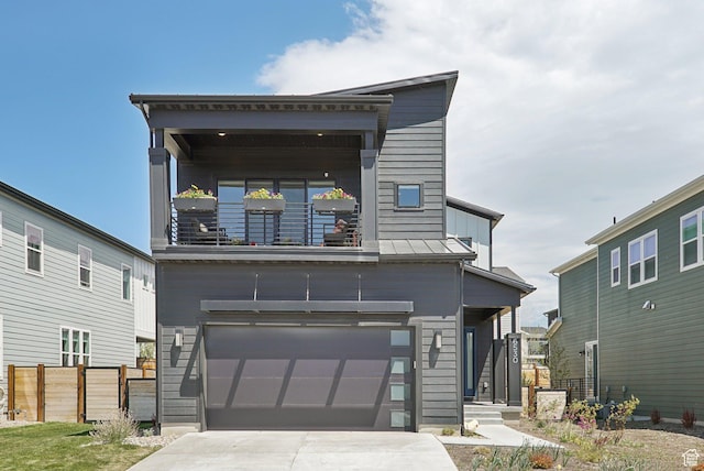 6530 Purple Poppy Ln, Snyderville, UT 84098 - modern home with an attached garage, driveway, and a balcony