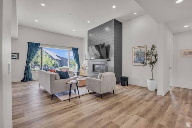 336 Big Meadow Dr, Kamas, UT 84036 - living area featuring recessed lighting, light wood-style flooring, baseboards, and a fireplace