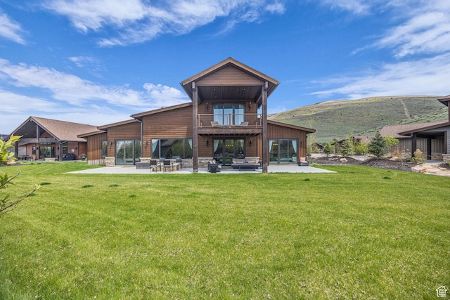 336 Big Meadow Dr, Kamas, UT 84036 - back of property featuring a balcony, a patio area, an outdoor living space, and a yard