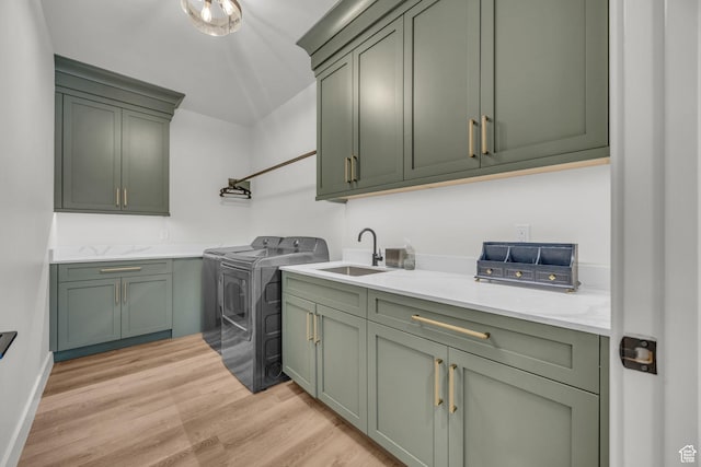 336 Big Meadow Dr, Kamas, UT 84036 - washroom featuring cabinet space, separate washer and dryer, and light wood-type flooring