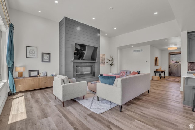 336 Big Meadow Dr, Kamas, UT 84036 - living area with light wood-style floors, recessed lighting, and a large fireplace