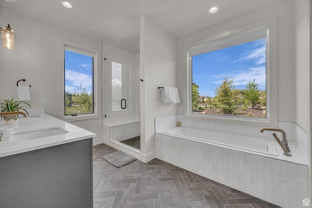 336 Big Meadow Dr, Kamas, UT 84036 - bathroom featuring a garden tub, healthy amount of natural light, a shower stall, double vanity, and recessed lighting