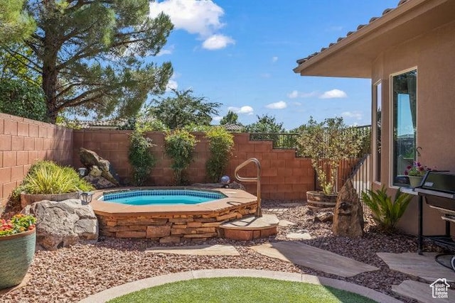 1618 N 775 W, Washington, UT 84780 - view of swimming pool with an in-ground hot tub and a fenced backyard