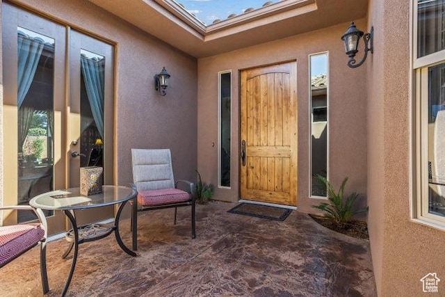 1618 N 775 W, Washington, UT 84780 - doorway to property featuring a patio and stucco siding