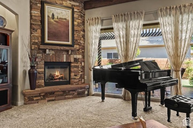 1618 N 775 W, Washington, UT 84780 - sitting room with a stone fireplace, carpet flooring, and healthy amount of natural light