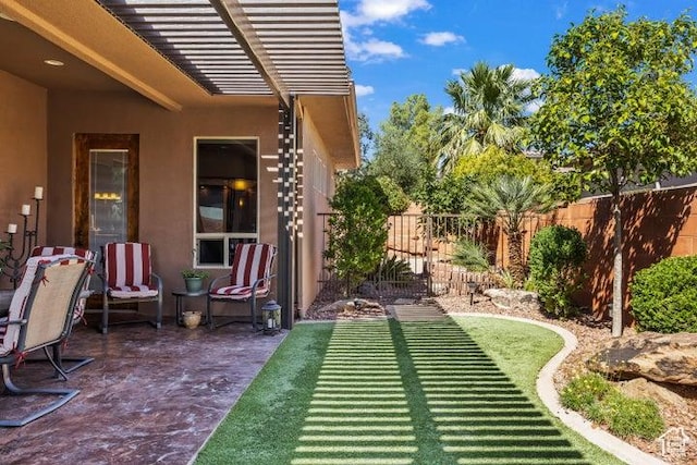1618 N 775 W, Washington, UT 84780 - fenced backyard featuring a patio