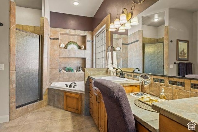 1618 N 775 W, Washington, UT 84780 - full bathroom with a shower stall, a garden tub, vanity, tile patterned floors, and tile walls