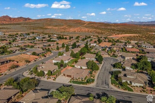 1618 N 775 W, Washington, UT 84780 - aerial overview of property's location with a mountainous background and nearby suburban area