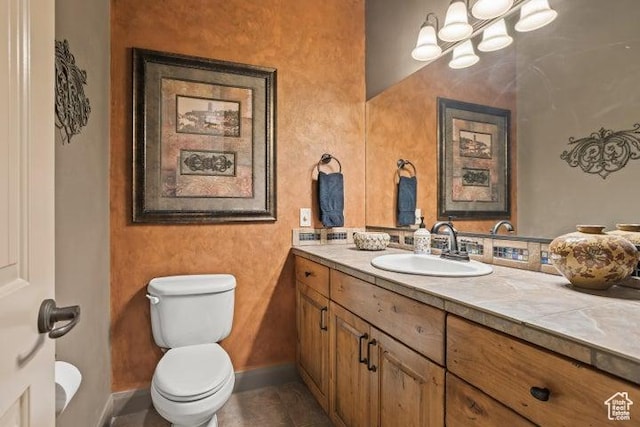 1618 N 775 W, Washington, UT 84780 - bathroom featuring vanity, toilet, baseboards, and tile patterned flooring