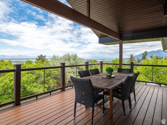 4253 S Spring Rd E, Ogden, UT 84403 - wooden terrace featuring a mountain view and outdoor dining space