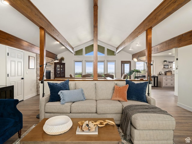 4253 S Spring Rd E, Ogden, UT 84403 - living room featuring decorative columns, wood finished floors, and baseboards
