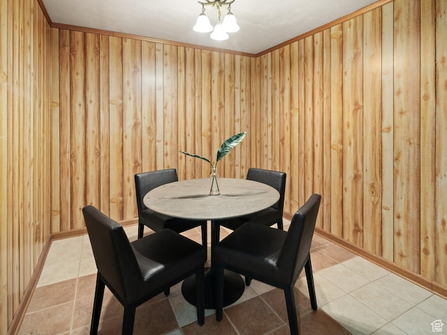 4253 S Spring Rd E, Ogden, UT 84403 - dining space featuring light tile patterned floors and wooden walls