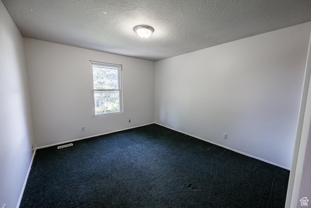 1070 E 120 S, Orem, UT 84097 - empty room with dark colored carpet and baseboards