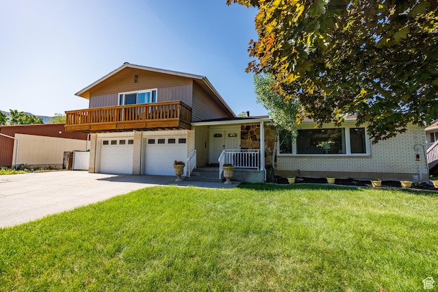 1070 E 120 S, Orem, UT 84097 - split level home featuring a porch, driveway, a front yard, a garage, and brick siding