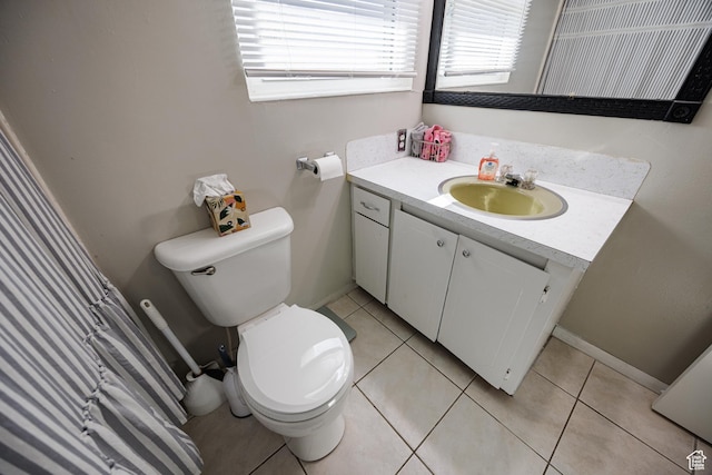1070 E 120 S, Orem, UT 84097 - bathroom featuring vanity, toilet, tile patterned flooring, and baseboards