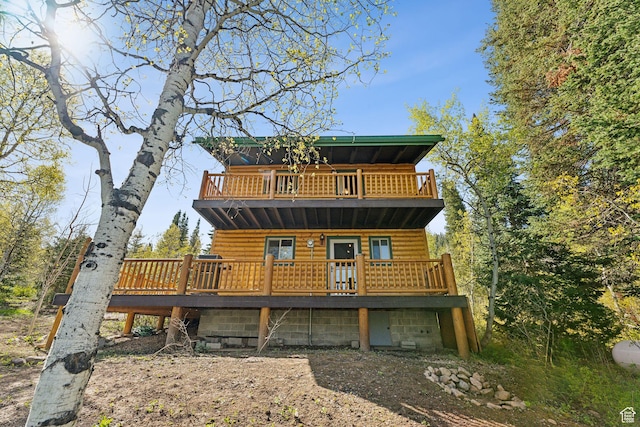 5399 E Targhee Dr E, Oakley, UT 84055 - back of house with a wooden deck
