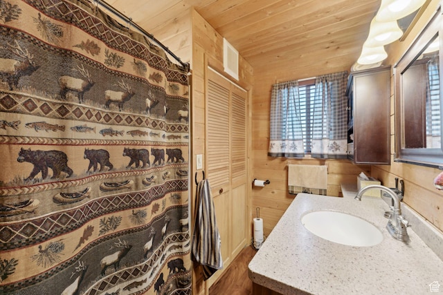5399 E Targhee Dr E, Oakley, UT 84055 - full bath featuring wooden ceiling, vanity, wood walls, wood finished floors, and a shower with shower curtain