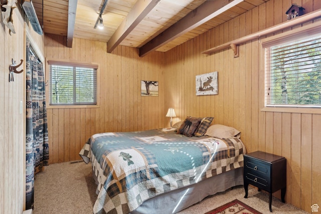 5399 E Targhee Dr E, Oakley, UT 84055 - carpeted bedroom featuring wooden ceiling with exposed beams and wooden walls