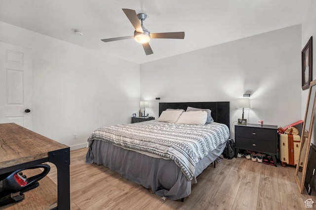 5586 W 10130 N, Highland, UT 84003 - bedroom featuring light wood finished floors, a ceiling fan, and baseboards