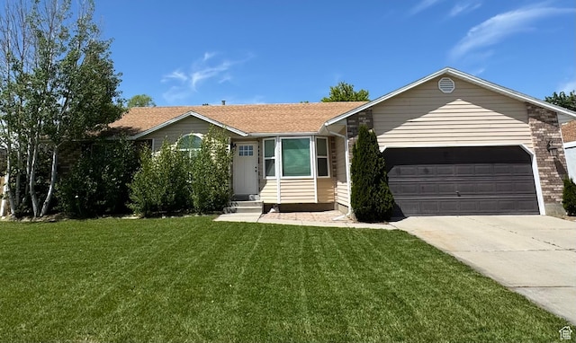 5586 W 10130 N, Highland, UT 84003 - ranch-style house with concrete driveway, a garage, and a front lawn