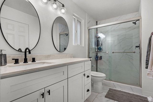5586 W 10130 N, Highland, UT 84003 - full bathroom featuring marble look tile flooring, vanity, toilet, and a marble finish shower