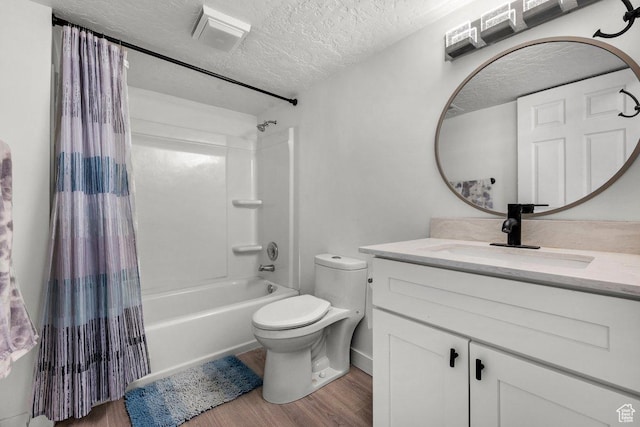 5586 W 10130 N, Highland, UT 84003 - bathroom with wood finished floors, shower / tub combo with curtain, vanity, a textured ceiling, and toilet
