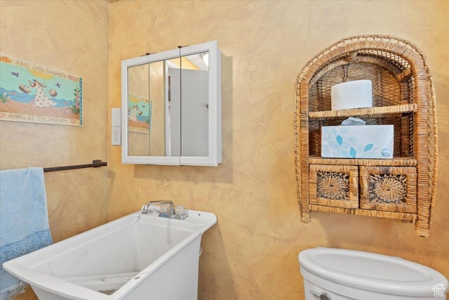3275 N 250 E, North Ogden, UT 84414 - full bath featuring a freestanding tub, toilet, and a textured wall