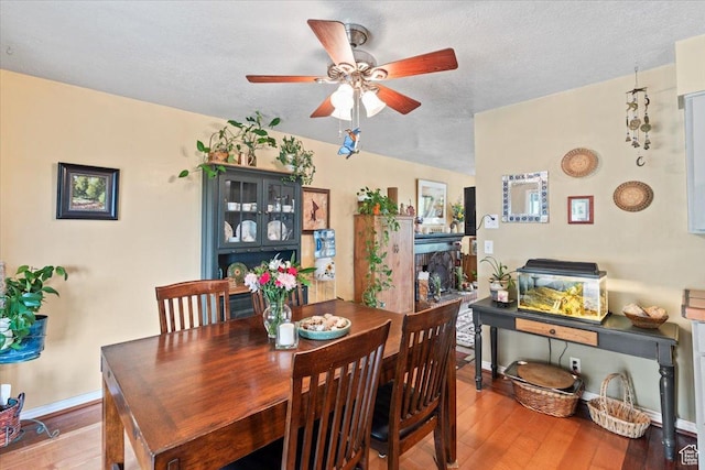 3275 N 250 E, North Ogden, UT 84414 - dining space featuring ceiling fan, light wood-style flooring, baseboards, and a textured ceiling
